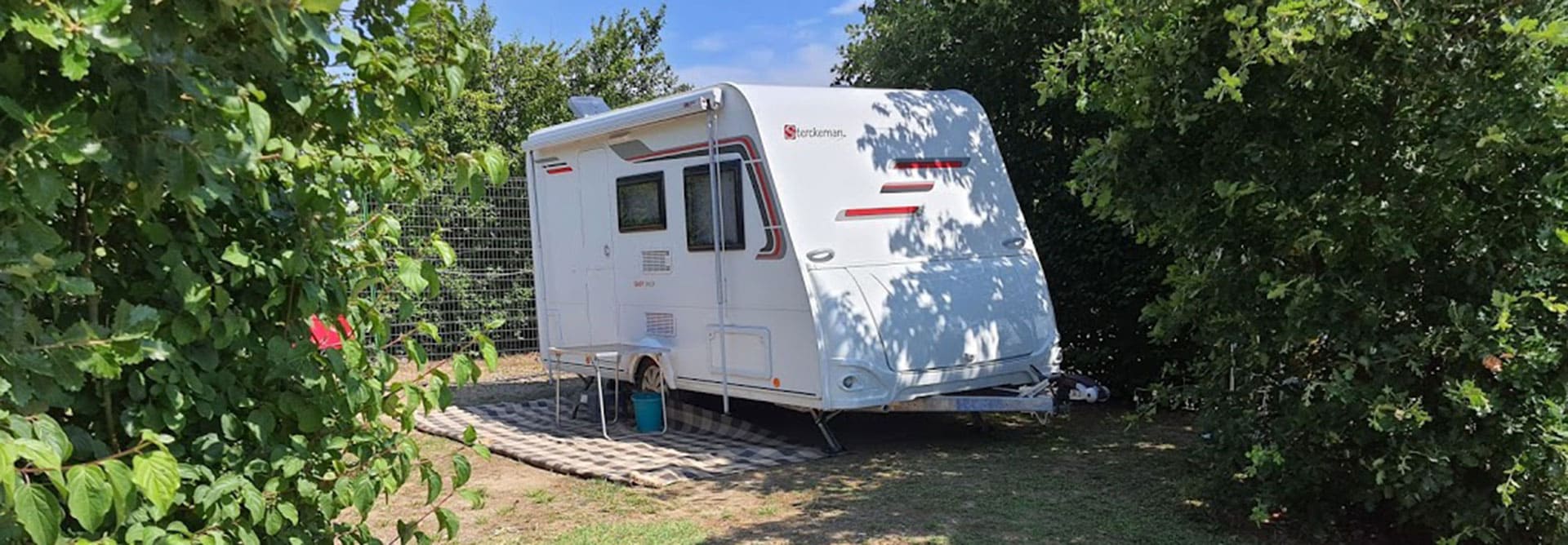 Pitch for motorhome at Escale Occitane, campsite near Carcassonne